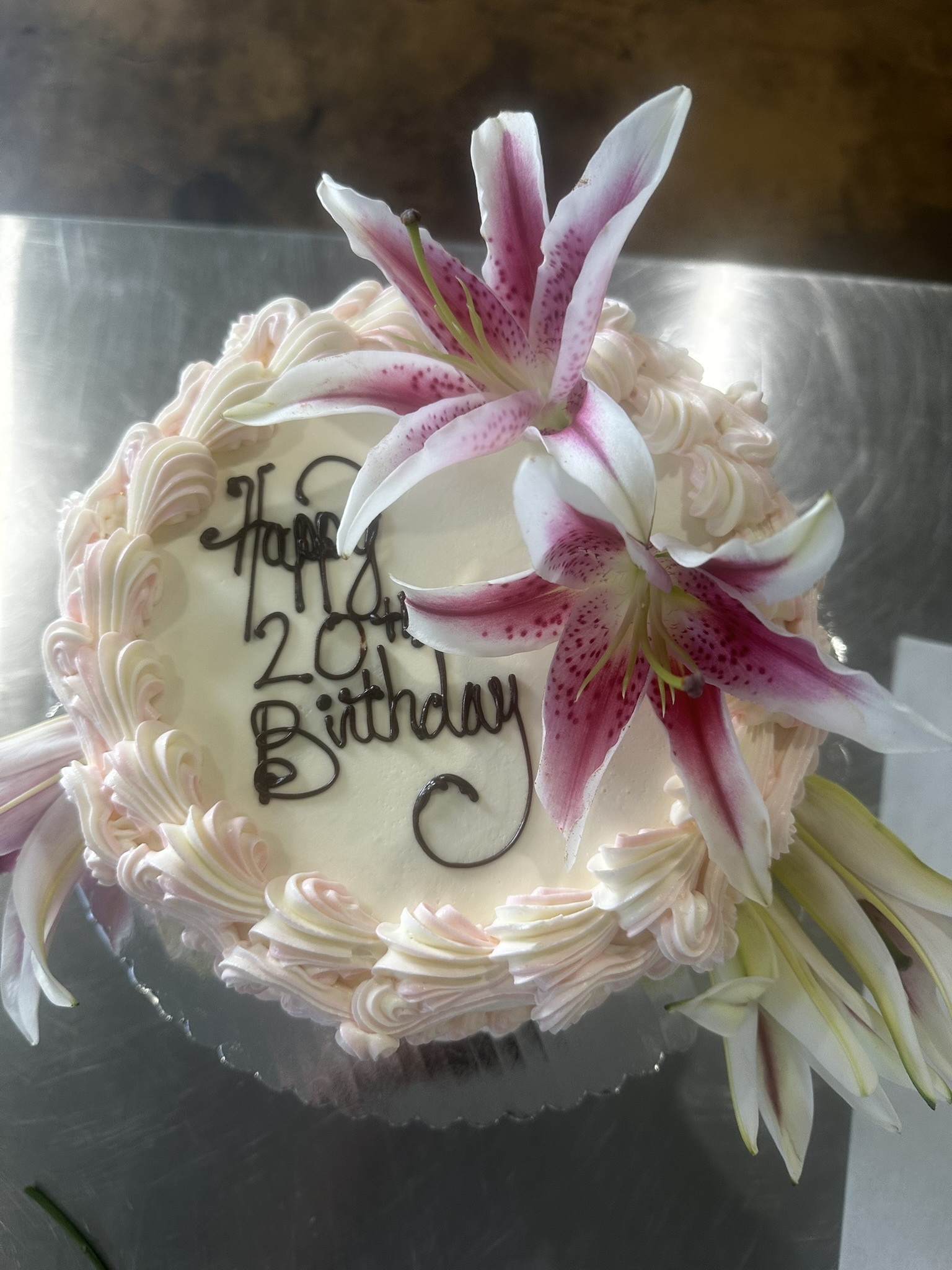 Buttercream birthday cake with floral styling
